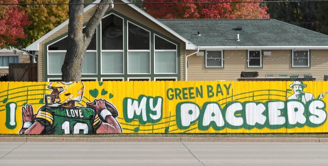 Meet the Artist Behind Green Bay’s Iconic Fence Art